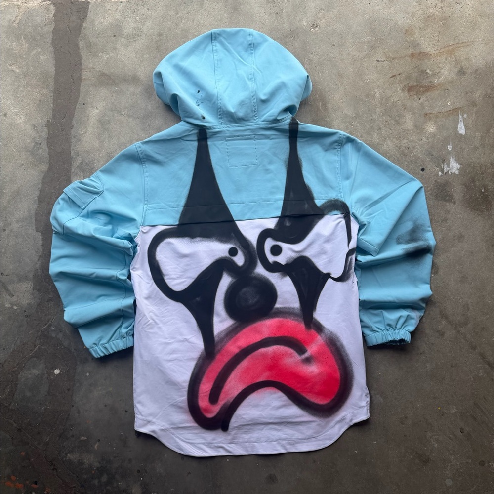 Stylish Blue and White Raincoat with Artistic Design